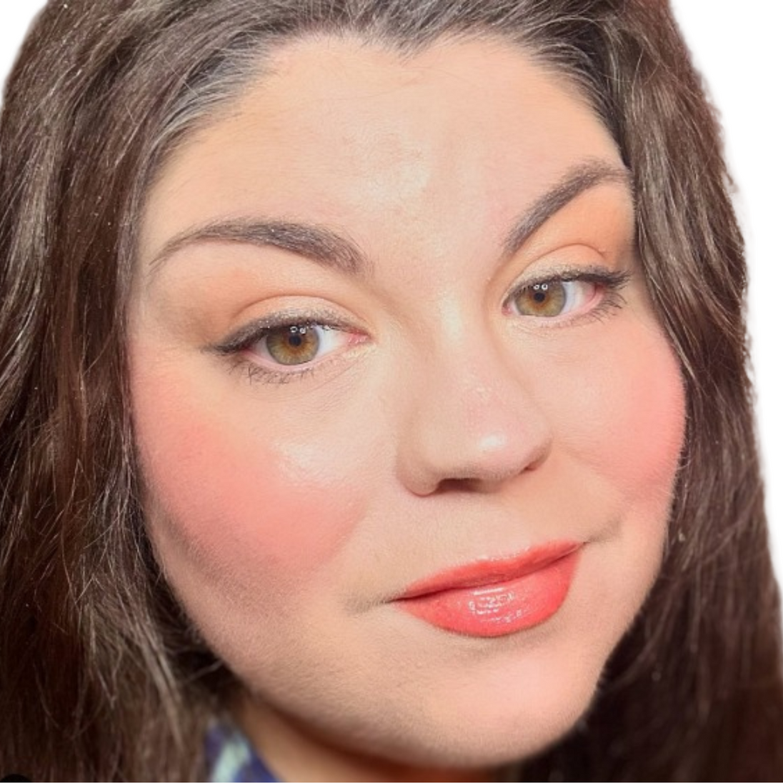 Close-up of Reillie Beauty rose petal Cheek Tint on skin