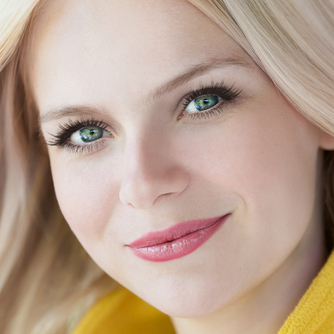 "Woman with fair skin wearing Ashlie Foundation, light beige shade with nourishing botanicals