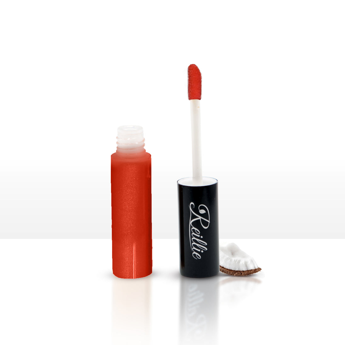 Reillie Beauty Organic Lip Gloss in Cinnamon, warm orange shimmering shade in tube with nourishing botanicals