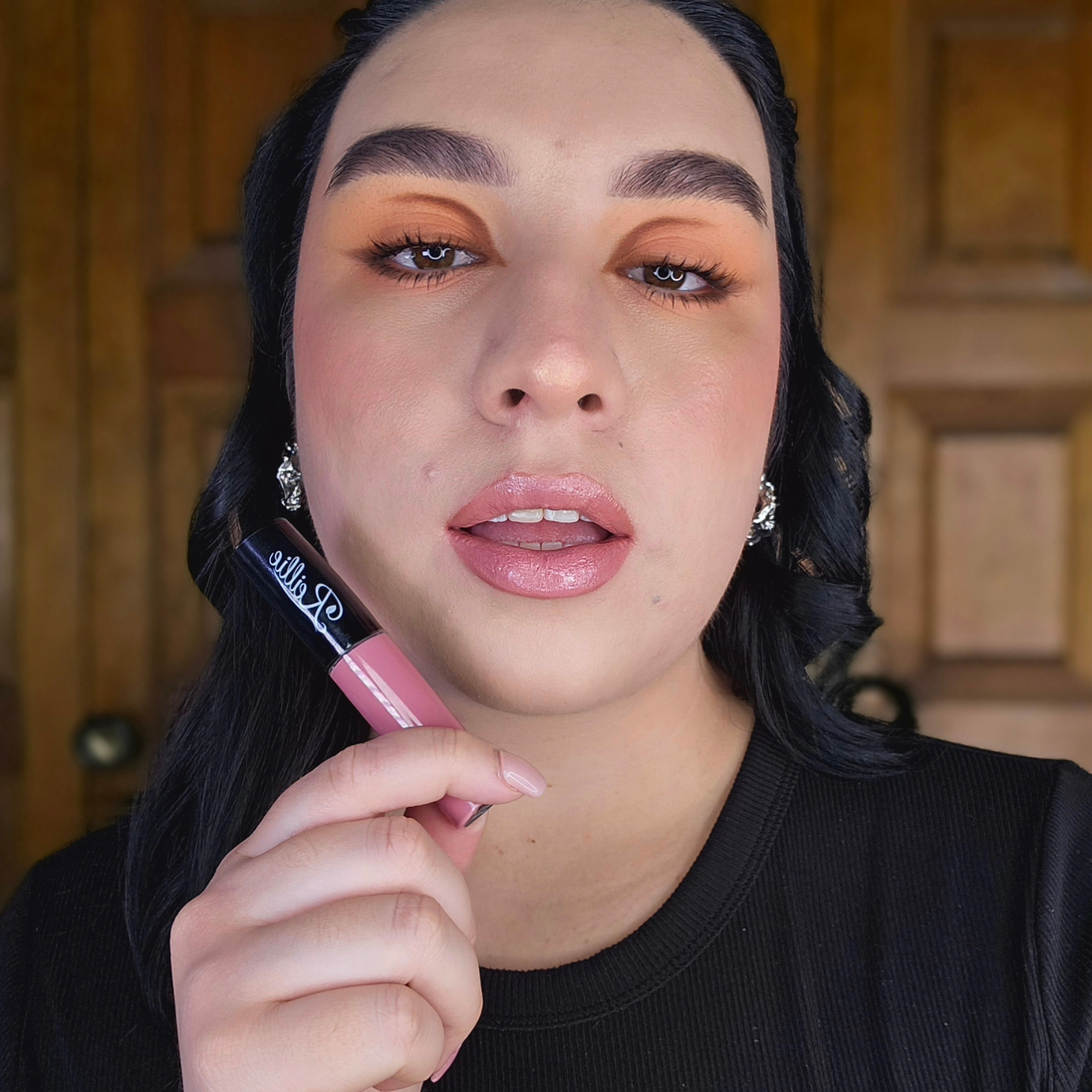 Reillie Beauty Luscious Guava Lip Gloss applied on lips of fair skin, soft pink and glossy