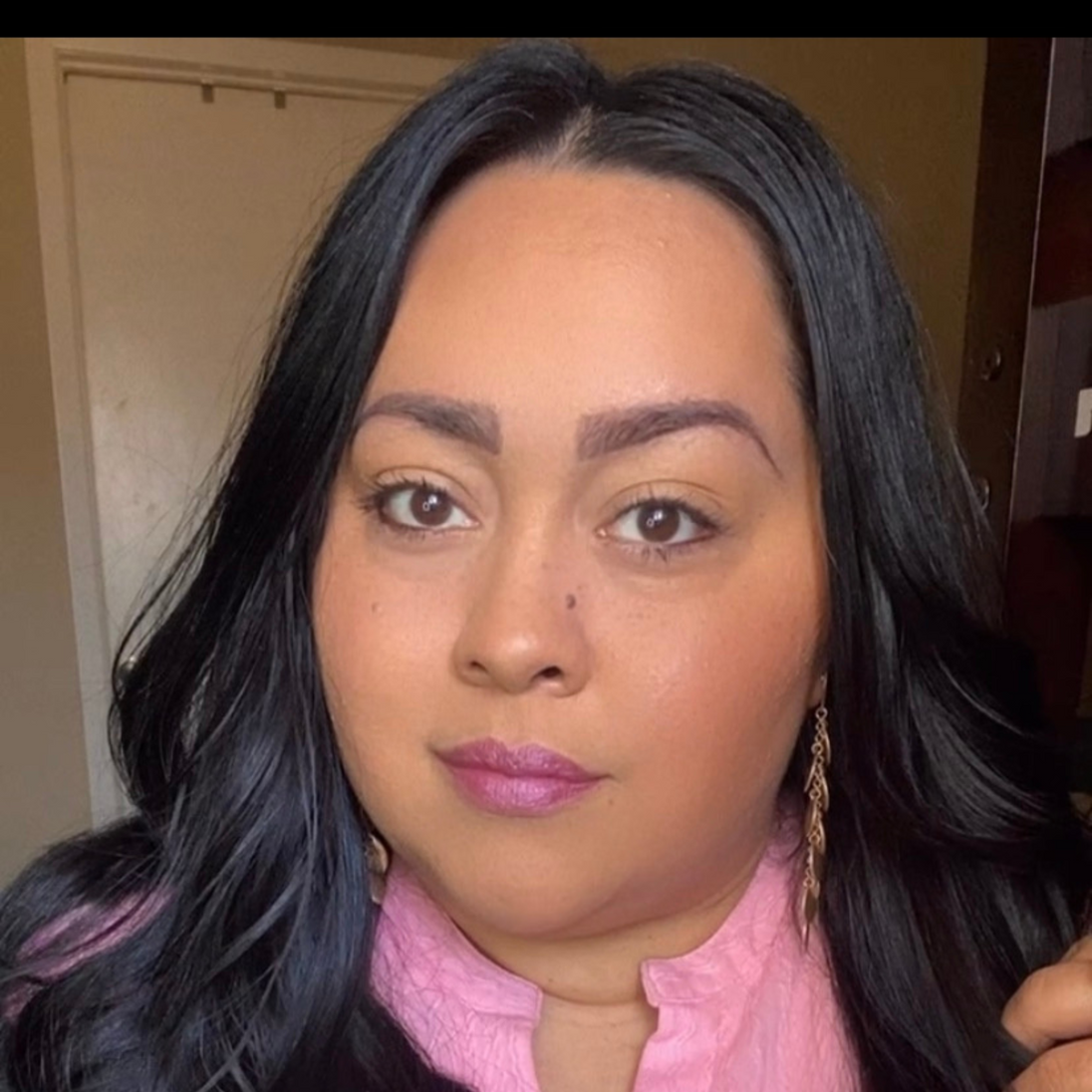 Reillie Beauty Wisteria Lipstick applied on fair and dark skin, showing shade as soft purple on fair skin and fuchsia on dark skin