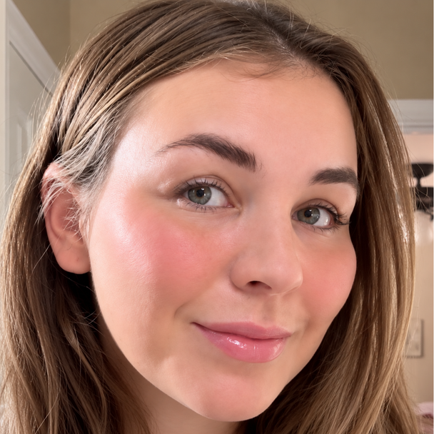 Women wearing vanilla lip gloss and petal flush tint.