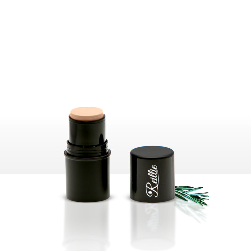 Natural cream highlighter with soft dewy glow on skin