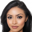 Woman with Warm Light/Medium skin wearing Ana Foundation with nourishing botanicals