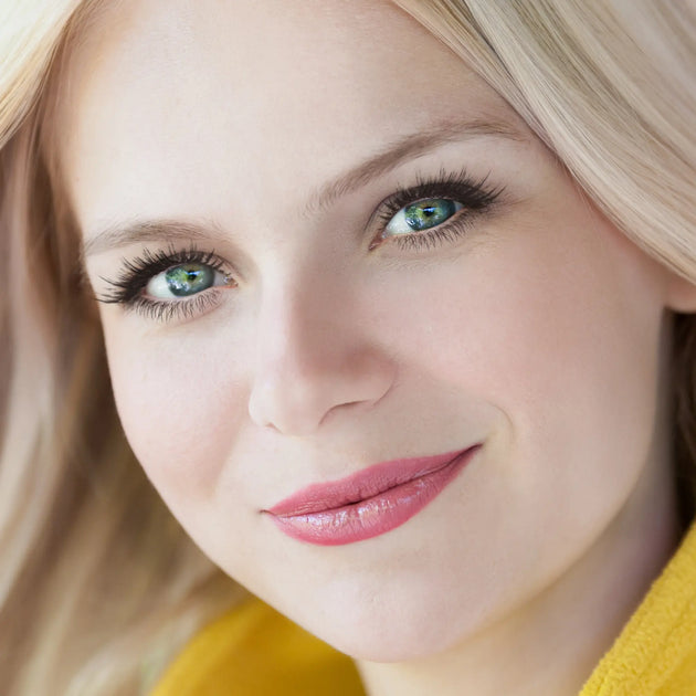 Woman with fair skin wearing Ashlie Foundation, light beige shade with nourishing botanicals