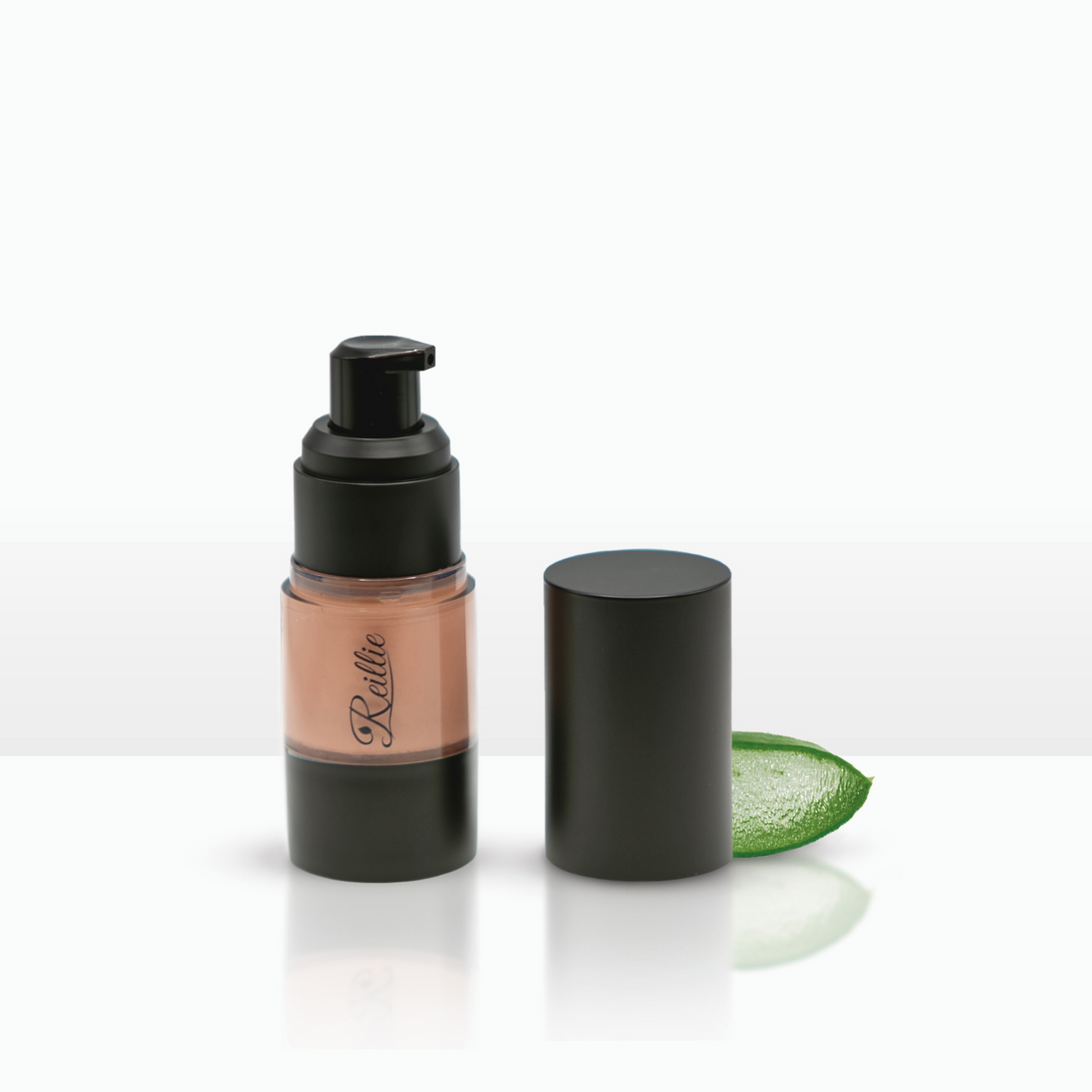 Reillie Beauty Meagan Foundation, Cool Light/Medium shade in bottle with nourishing botanicals