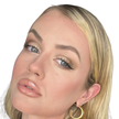 Woman applying Reillie Beauty Organic Highlighter on face, luminous natural glow with botanical formula
