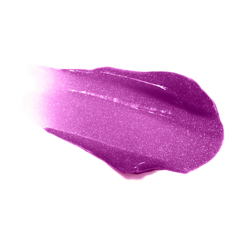 Swatch of Reillie Beauty Organic Lip Gloss in Dragon Fruit, vibrant fuchsia shimmering shade with nourishing botanicals
